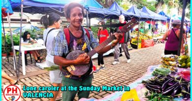 SIGHTS OF NEGROS ORIENTAL - PHOTO OF THE DAY - Lone carol singer at Sunday Market in Valencia